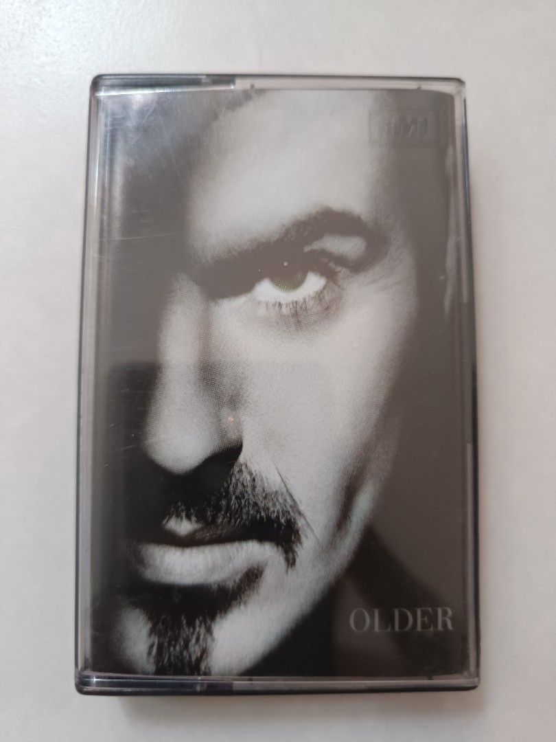 George Michael Older Original Cassette (Category: Other Audio Equipment) located in Singapore. Submitted by nikpmc (Listing ID 1367649864, Image 1). Description: Older is the third studio album by English singer-songwriter George Michael, released on 13 May 1996 in Europe by Virgin Records and Aegean Records. The American release, which occurred one day later, was the first album released by DreamWorks Records. It was Michael's first studio album