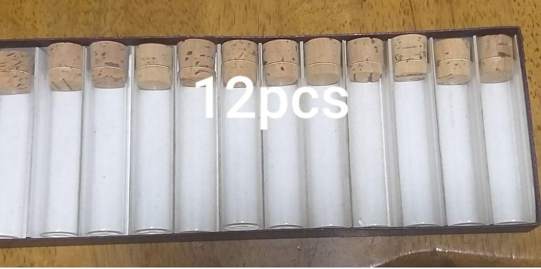GLASS TUBE CONTAINER (Category: Coffee & Tea Tableware) located in Rizal. Submitted by baltiq (Listing ID 1367653539, Image 1). Description: New Glass tube container with cork cover ✔️12pcs. with open box 📌bought but never used plan to put herbs & spices, pang-gift sana pero hindi kona nagawa😅 💰MOP: GCash.