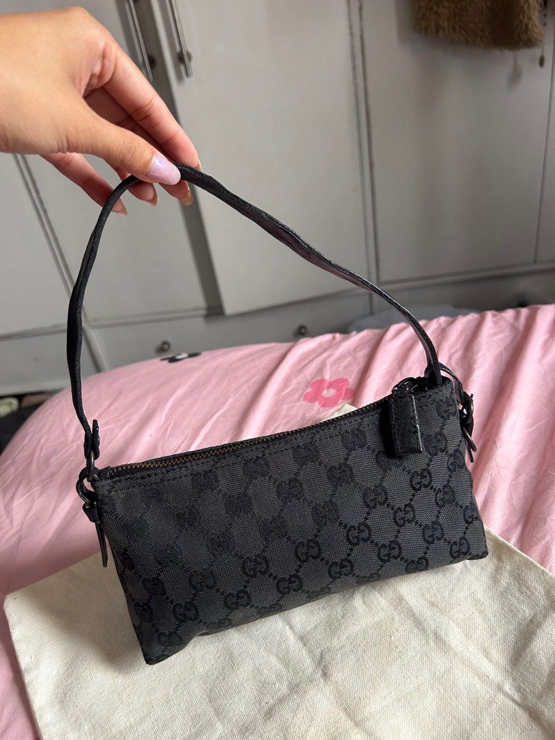 Gucci black pochette bag (Category: Luxury Bags & Wallets) located in Quezon City. Submitted by bagsonly2000 (Listing ID 1367506970, Image 1). Description: RANK AB no major flaws. need lang iplantsa yung handle :-)).