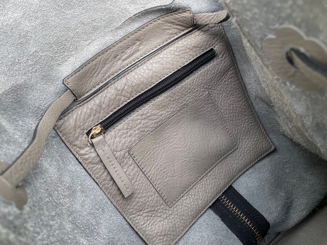 Katre Manila Calf Leather Bag (Category: Backpacks) located in Quezon City. Submitted by discoversomethingnice (Listing ID 1367660690, Image 3). Description: Katre Manila Calf Leather Bag • Material: Premium calf leather • Color: Light gray • Condition: Gently used, 8/10 – with minor signs of wear including faint marks/stains on the leather as shown in photos • Original Price: PHP 7,500 • Selling Price: PHP 2,200 only This stylish and roomy Katre
