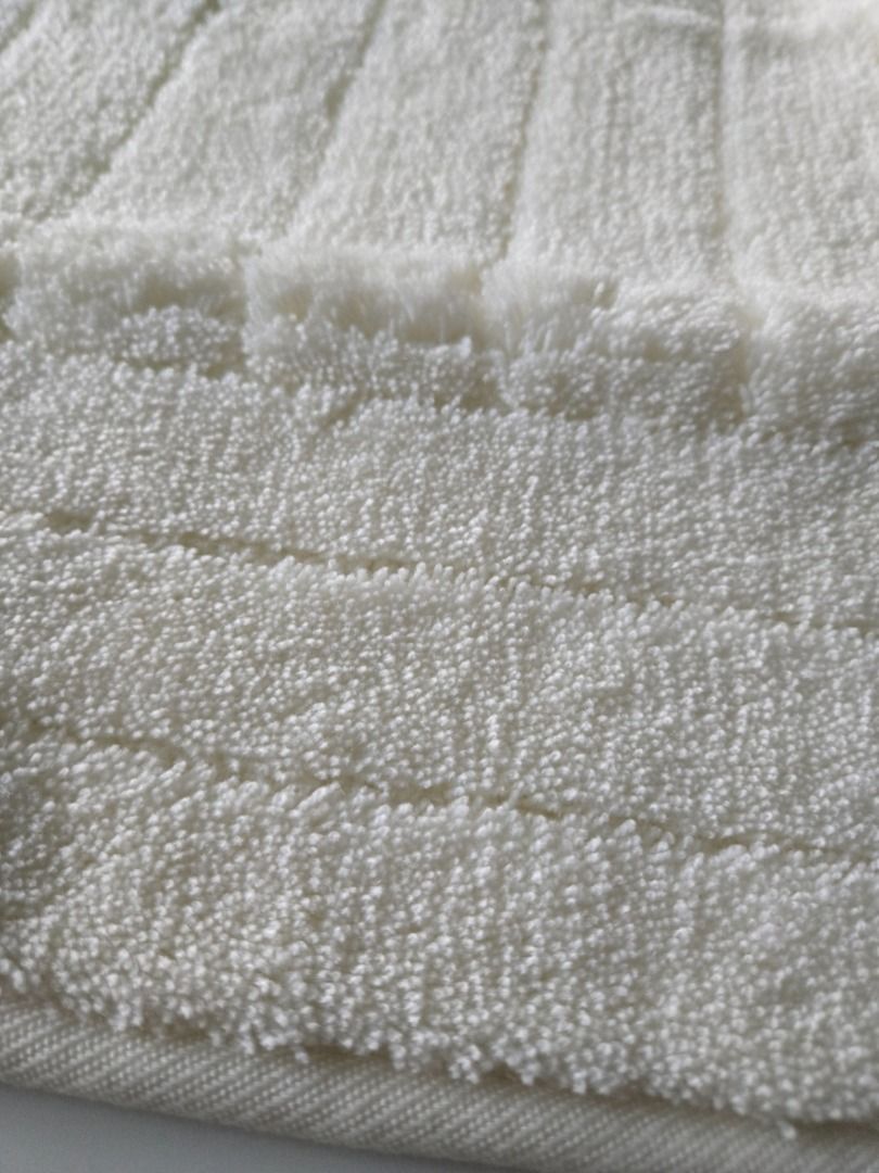 NITORI White Bath Mat 45 x 60 cm (Category: Bathroom & Kitchen Fixtures) located in Pasig City. Submitted by aya-2025 (Listing ID 1367557324, Image 3). Description: Material: Made with Toyobo acrylic fiber for cleanliness and comfort. Size: 45 x 60 cm (17.7 x 23.6 inches). Features: Highly absorbent and quick-drying. Antibacterial and odor-resistant. Soft and comfortable to step on. Care: Machine washable with a net. Brand: Nitori. Original price