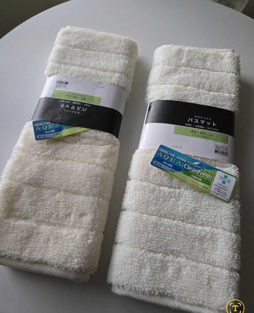 NITORI White Bath Mat 45 x 60 cm (Category: Bathroom & Kitchen Fixtures) located in Pasig City. Submitted by aya-2025 (Listing ID 1367557324, Image 1). Description: Material: Made with Toyobo acrylic fiber for cleanliness and comfort. Size: 45 x 60 cm (17.7 x 23.6 inches). Features: Highly absorbent and quick-drying. Antibacterial and odor-resistant. Soft and comfortable to step on. Care: Machine washable with a net. Brand: Nitori. Original price