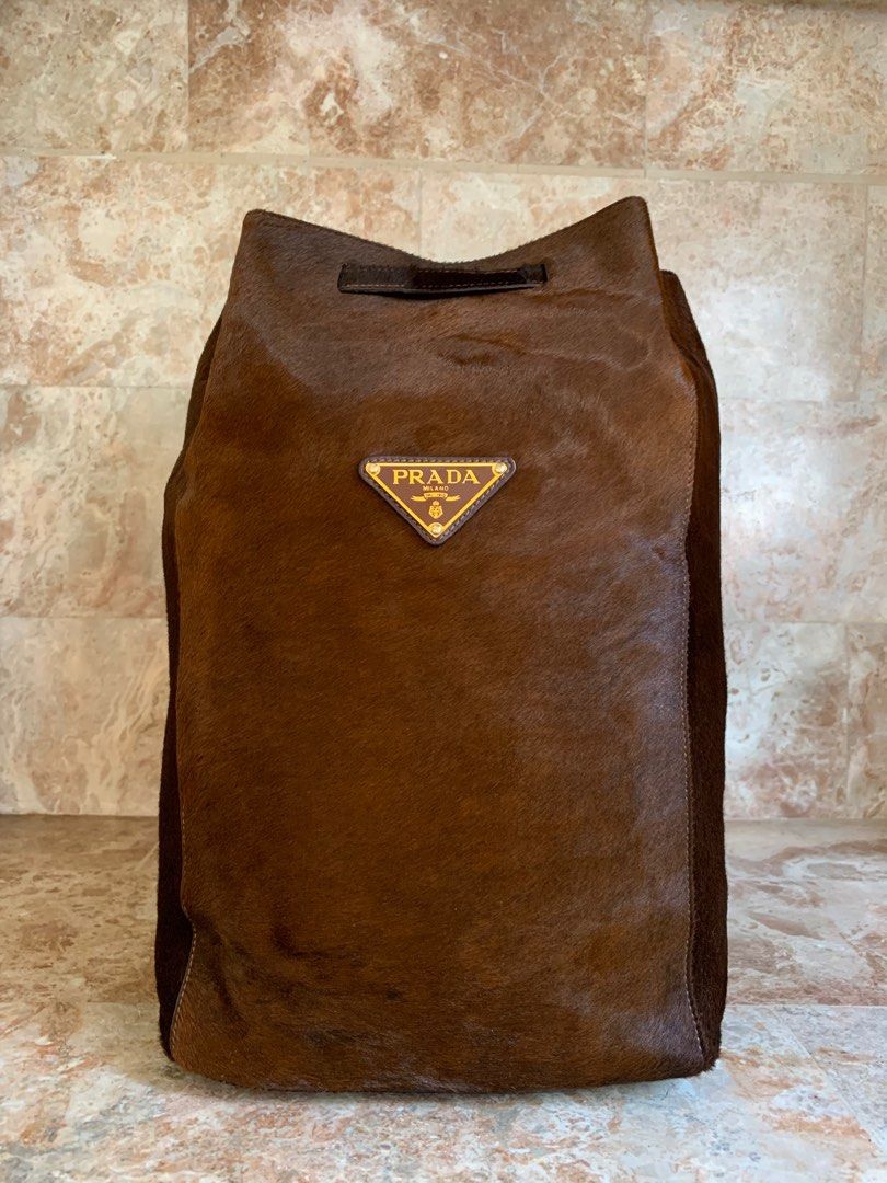 Prada Drawstring bagpack (Category: Luxury Bags & Wallets) located in Baguio. Submitted by 2600ave. (Listing ID 1367572958, Image 3). Description: Original Prada Drawstring Bagpack ✨ Superb! Ang ganda po nito ❤️ No issues Excellent Condition Asking price: 23,000 Negotiable.