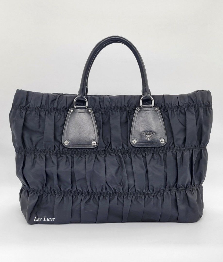 Prada Tessuto Gauffre Bag (Category: Luxury Bags & Wallets) located in Paranaque City. Submitted by jlee_closet (Listing ID 1367528962, Image 1). Description: authentic Prada tessuto gauffre bag in pristine condition. the perfect bag for work, school, or daily use. spacious enough and super light weight! meet ups okay.