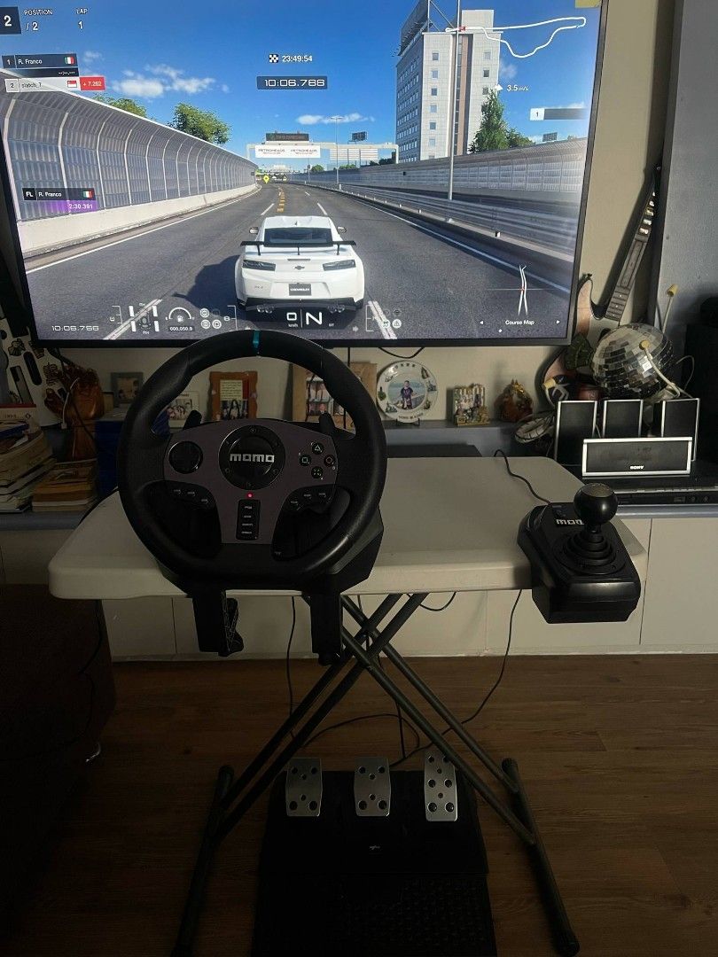 PXN V9 Steering Wheel (PC, PS3, PS4, XBOX, SWITCH) (Category: Controllers) located in San Pedro. Submitted by slatch_7 (Listing ID 1367507102, Image 3). Description: PXN V9 Steering Wheel w/ Shifter Bought last year October 2024 Perfect for PC, PS4, Xbox One, Nintendo Switch and more! Tested Games: Forza, GT7, Euro Truck, Assetto Corsa 270° - 900° adjustable wheel rotation Dual Vibration feedback for realistic driving.