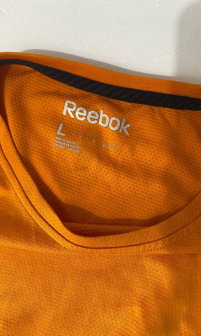 REEBOK MENS DRI FIT RUNNING TEE (Category: Activewear) located in Manila. Submitted by eriiicaspage (Listing ID 1367588499, Image 3). Description: PREOWNED ,'Lightly Used REEBOK MENS DRI FIT RUNNING TEESHIRT Orange Large -XL Min Sign of Used Good Condition 9/10.