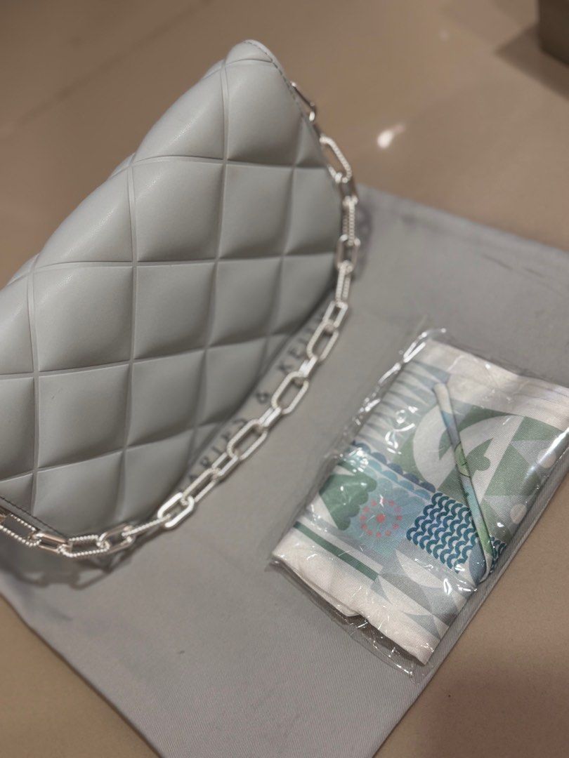 Charles and Keith Sling Wallet Bag (Category: Luxury Bags & Wallets) located in Manila. Submitted by greta_flores (Listing ID 1367829725, Image 2). Description: Bandnew po ito Rfs: too many bags.