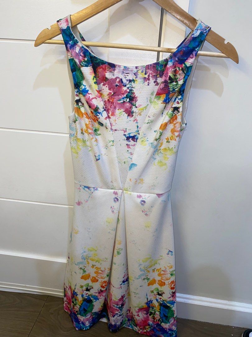 Floral Dress (Category: Dresses) located in Quezon City. Submitted by gurl_clutter (Listing ID 1367785297, Image 1). Description: FOR RENT ‼️‼️ casual backless dress for dinner or events, graduation. 📍cubao, qc.