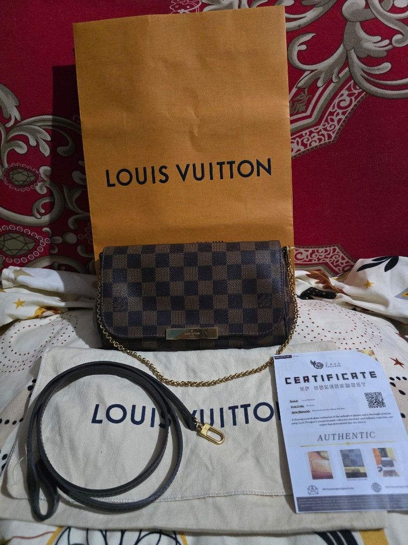 Guaranteed original LV damier favorite PM (Category: Luxury Bags & Wallets) located in Manila. Submitted by jels17120523 (Listing ID 1367832598, Image 1). Description: Guaranteed original lv damier favorite PM size comes with dustbag, paper bag, 2 straps and luxe paragon certificate. some hairlines on the plate. no rubs and open piping. In excellent condition. money back guaranteed if proven fake by a legit authenticator..