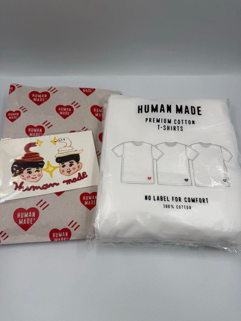 Human Made (Category: Activewear) located in Cavite. Submitted by ajdg03 (Listing ID 1367735809, Image 3). Description: 3 pcs 1-PACK T-SHIRT SET Set of three T-shirts, each with a different colored heart logo printed on the left hem. ITEM ID: HM29CS035 MATERIAL: 100% COTTON COLOR: WHITE .