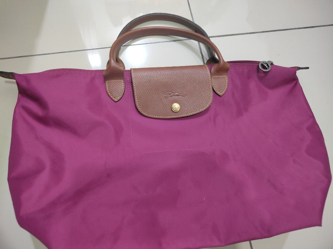 Longchamp Authentic Short Handle Bag (Category: Tote Bags) located in Ipoh. Submitted by venicelove86 (Listing ID 1367728146, Image 1). Description: Size: Large Tote Bag Seldom used Keep only Inner is white so with some stain Not for fussy buyer.