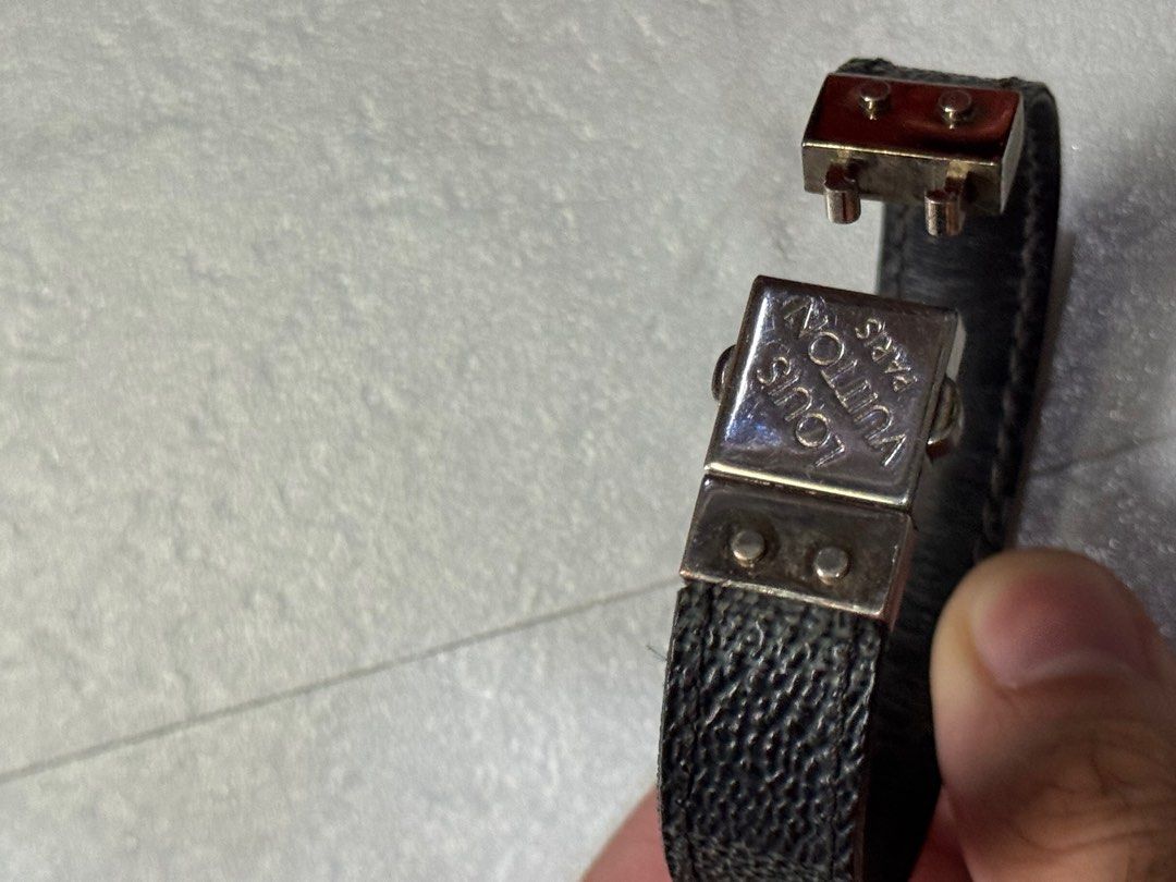 Louis Vuitton check it damier graphite bracelet (Category: Luxury Accessories) located in Manila. Submitted by cobrataters (Listing ID 1367750879, Image 3). Description: Original Louis Vuitton check it damier graphite Minor scratches due to It’s age. Costs more than 20k srp Bracelet only no box pouch etc. Guaranteed original 5k only fixed.