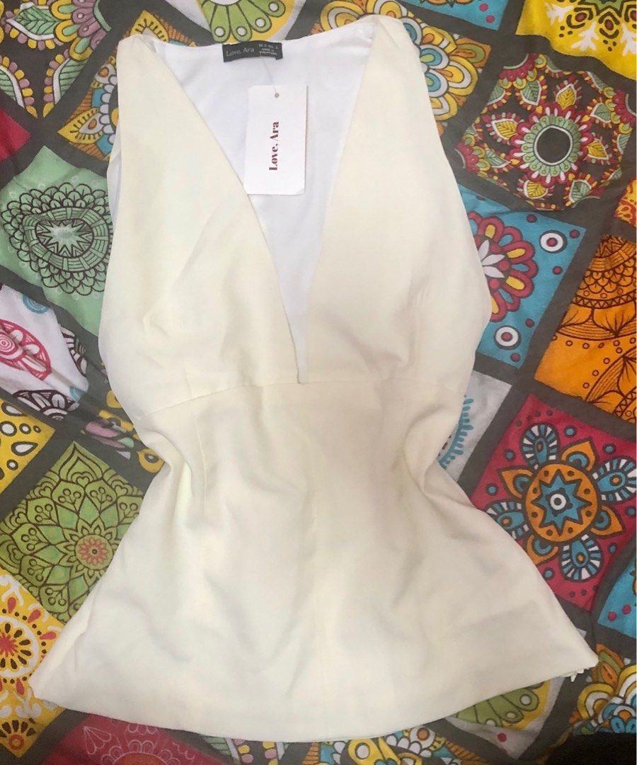 LOVEARA TOP (Category: Blouses) located in Marikina City. Submitted by declutterwcyz (Listing ID 1367715677, Image 3). Description: pls look at the pictures for condition never worn with issue rush need money rfs: too big size s-m.
