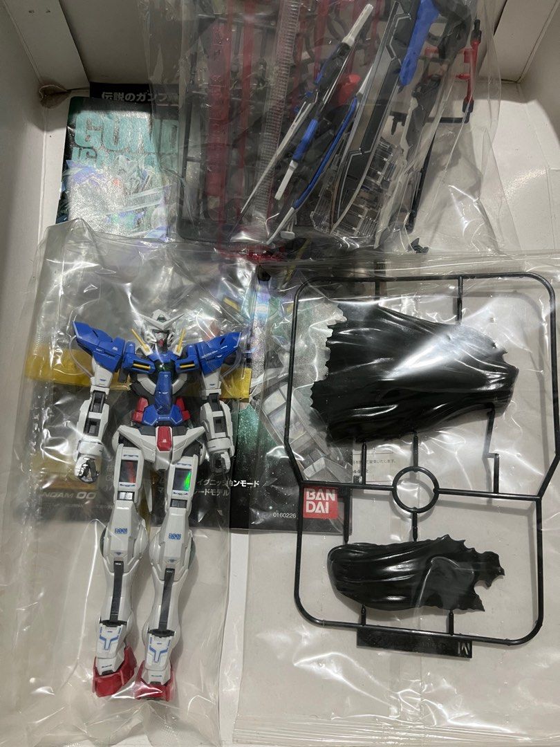 1/100 MG Exia Ignition Mode GN-001 (Category: Gundam & Model Kits) located in Manila. Submitted by nextwavetech0428 (Listing ID 1367844055, Image 2). Description: MG Gundam Exia Ignition Mode GN-001 -snap-built then put back in the box -box & manual 🚨issue: some stickers/decals were applied 📍Antipolo City.