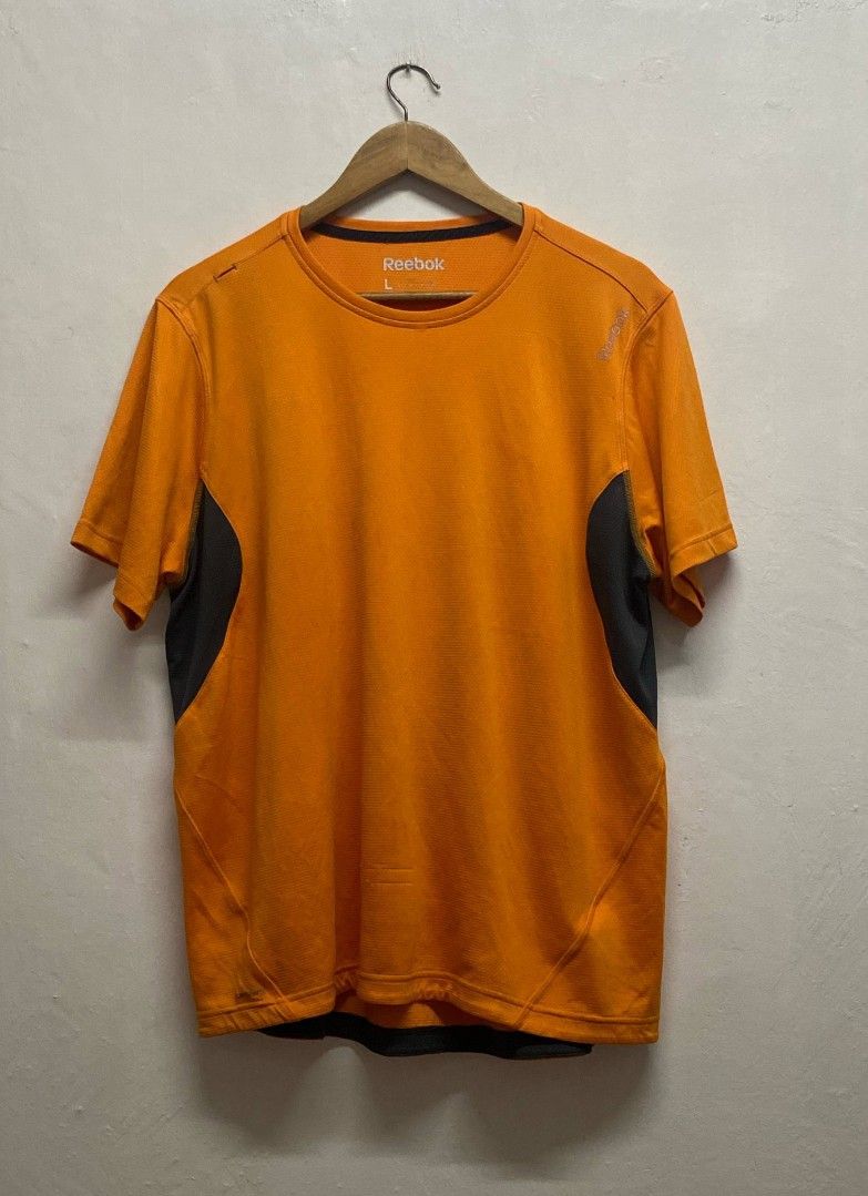 REEBOK MENS DRI FIT RUNNING TEE (Category: Activewear) located in Manila. Submitted by eriiicaspage (Listing ID 1367588499, Image 2). Description: PREOWNED ,'Lightly Used REEBOK MENS DRI FIT RUNNING TEESHIRT Orange Large -XL Min Sign of Used Good Condition 9/10.