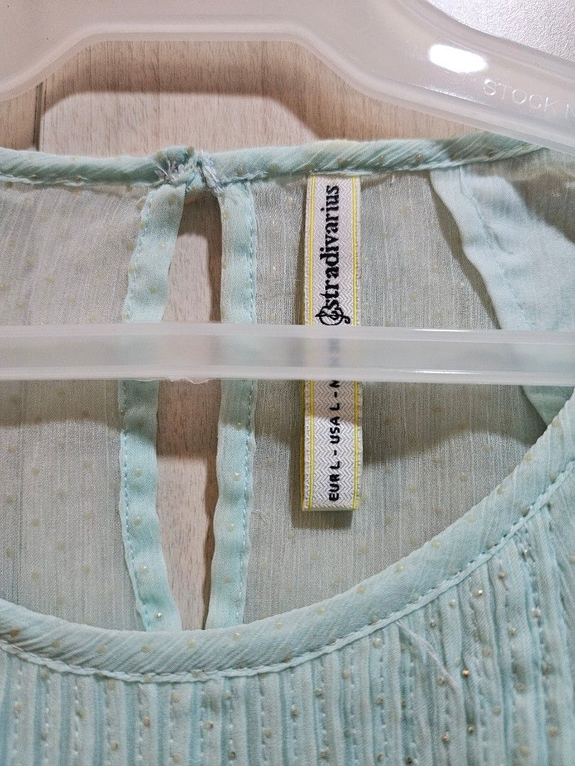 Stradivarius Sleeveless Sheer Polka Dot Top (Category: Sleeveless) located in Quezon City. Submitted by sunrise.declutter (Listing ID 1367788995, Image 2). Description: Rfs: decluttering.