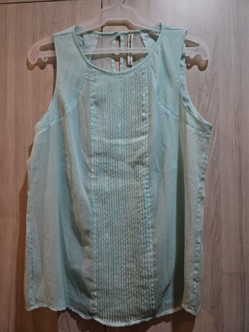 Stradivarius Sleeveless Sheer Polka Dot Top (Category: Sleeveless) located in Quezon City. Submitted by sunrise.declutter (Listing ID 1367788995, Image 1). Description: Rfs: decluttering.