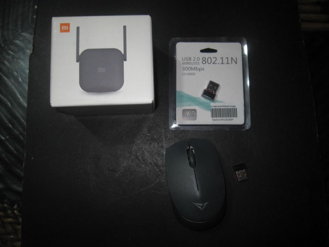 Wi-Fi Range Extender 2.0 Wireless USB Wireless Mouse (Category: Laptops & Notebooks) located in Baguio. Submitted by mrbrunno (Listing ID 1367722055, Image 1). Description: Wi-Fi Range Extender 2.0 Wireless USB Wireless Mouse All in as New condition, only used for 3 weeks. Selling all 3 together for 500p Paid 1450p.