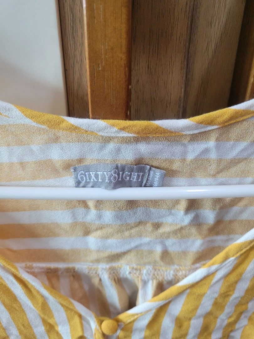 6ixty8ight yellow strip top (Category: Blouses) located in Caloocan City. Submitted by declutterjamiescloset (Listing ID 1367940819, Image 2). Description: 6ixty8ight brand (China brand) M size can fit Eu 36-38 size model 162cm/55kg.