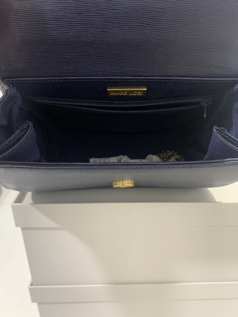 Hanae Mori Handbag (Category: Luxury Bags & Wallets) located in Makati City. Submitted by katrina_00 (Listing ID 1367904725, Image 2). Description: Sturdy handbag with gold chain long strap. One minor flaw, barely noticable. See photo.
