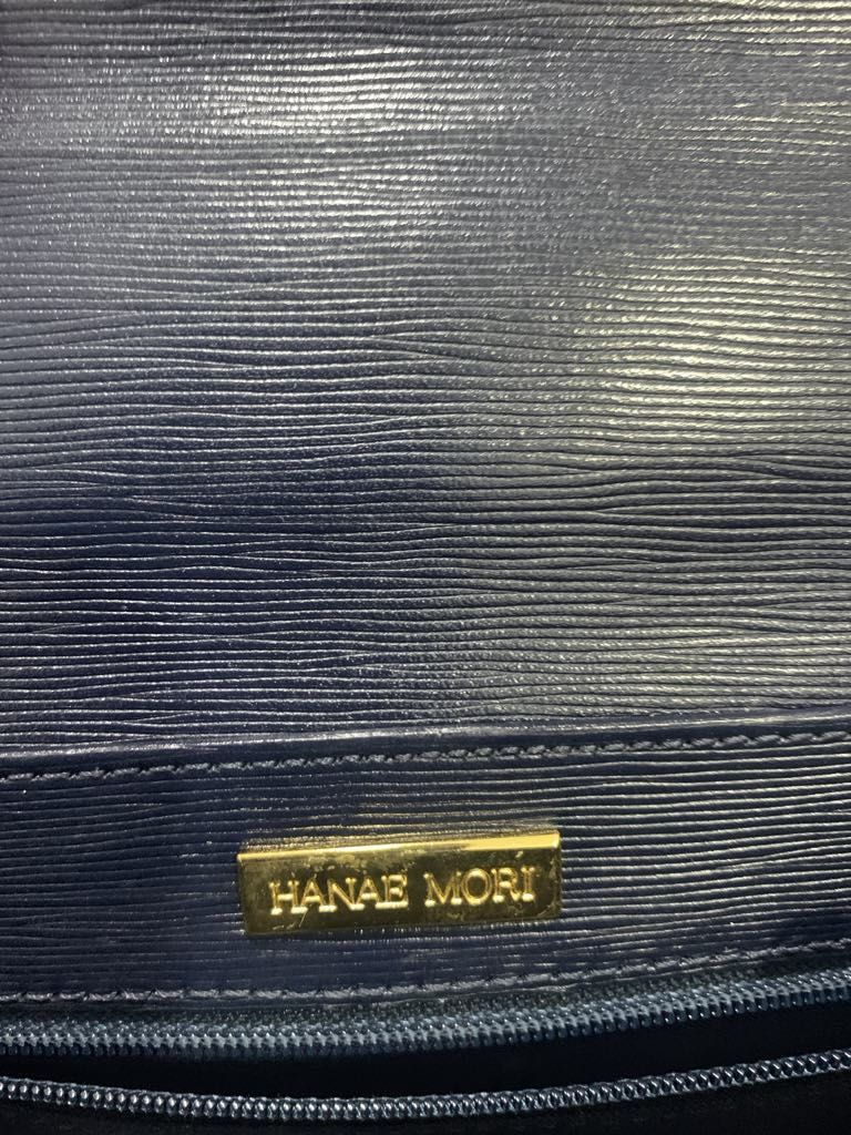 Hanae Mori Handbag (Category: Luxury Bags & Wallets) located in Makati City. Submitted by katrina_00 (Listing ID 1367904725, Image 3). Description: Sturdy handbag with gold chain long strap. One minor flaw, barely noticable. See photo.
