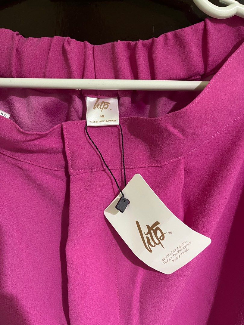HTP Trouser Pants (Category: Other Bottoms) located in Mariveles. Submitted by teppeyback (Listing ID 1367998894, Image 2). Description: Brand new with tag. Vibrant pink loose pants with pockets and garter high waist. HTP size ML. Rfs: declutterring Location: Bataan Payment options: BDO & Maya Shipping: shouldered by buyer .