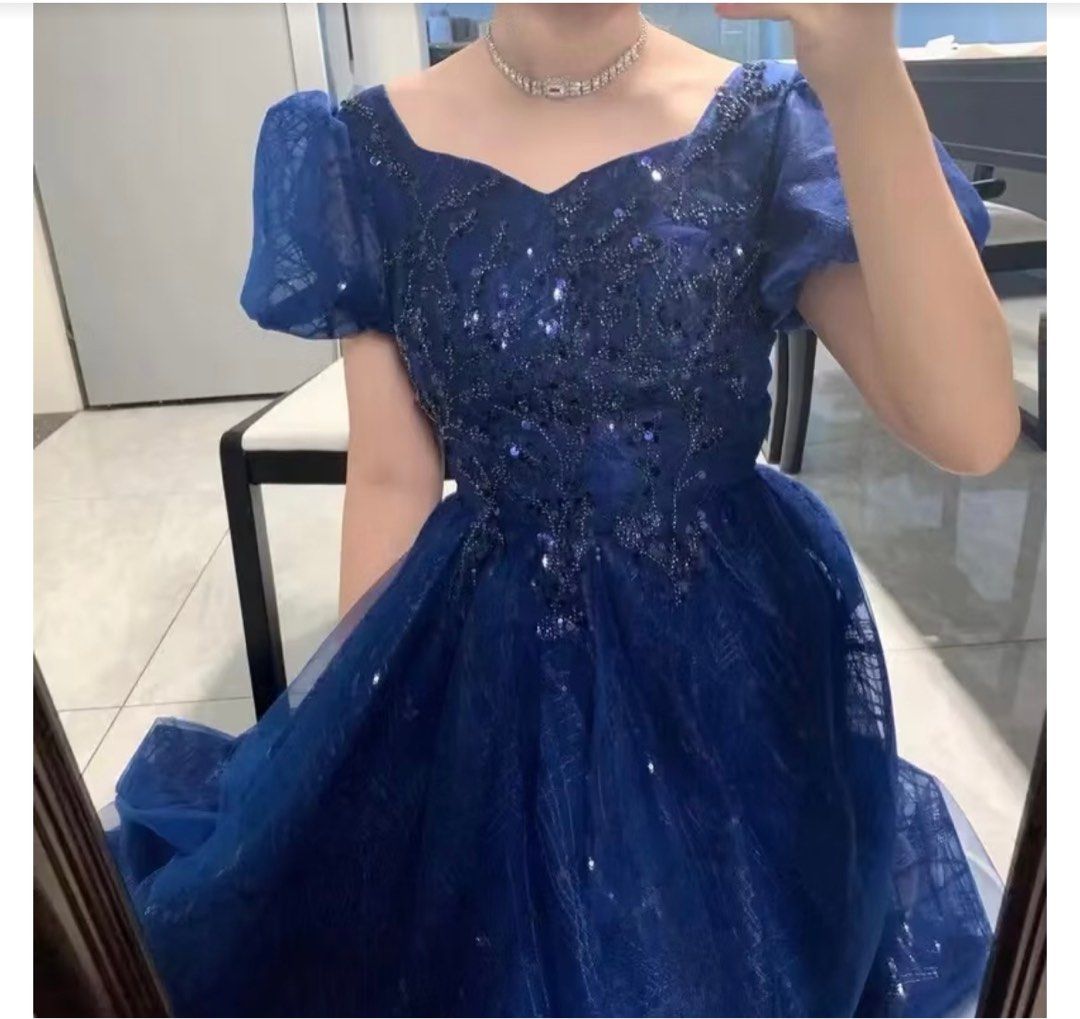 Long gown dress reprcied (Category: Evening dresses & gowns) located in Quezon City. Submitted by mcv1102 (Listing ID 1367881978, Image 1). Description: Likenew! Long gown Navy blue dress,, 💯✅GODD CONDITION LIKENEW ✅USED ONCE srp: 5k ✨🩵Dress Swing Type: Fall On The Ground Dress Dress Style: Deep V-Neck Style: Temperament Ladies/ins Style Clothing Style Details: Beading Dress Skirt Length: Long Skirt Sleeve Length: Short Sleeve Fabric/material: 