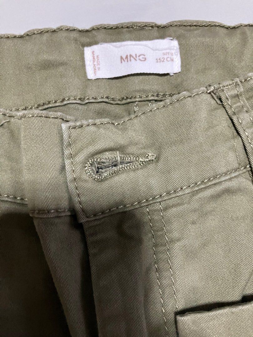 Mango Kids cargo pants (Category: Babies & Kids Fashion) located in Paranaque City. Submitted by leipicks (Listing ID 1367952630, Image 3). Description: Mango kids cargo pants color army green. Size 152 cm. No flaws. Outgrown. .