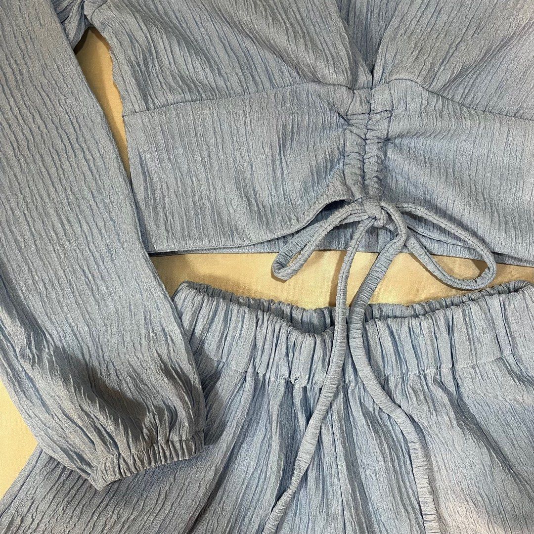 Misty Blue Top and Shorts Set (Category: Sets or Coordinates) located in Manila. Submitted by evyyp (Listing ID 1367868827, Image 3). Description: - deep v-neck, long sleeved, drawstring top - top is double lined - shorts have pockets - lighting made the color off! actual color is close to last pic - never used - size: S-M - length: 14 inches (shorts) 📍malate, manila mop: gcash only.