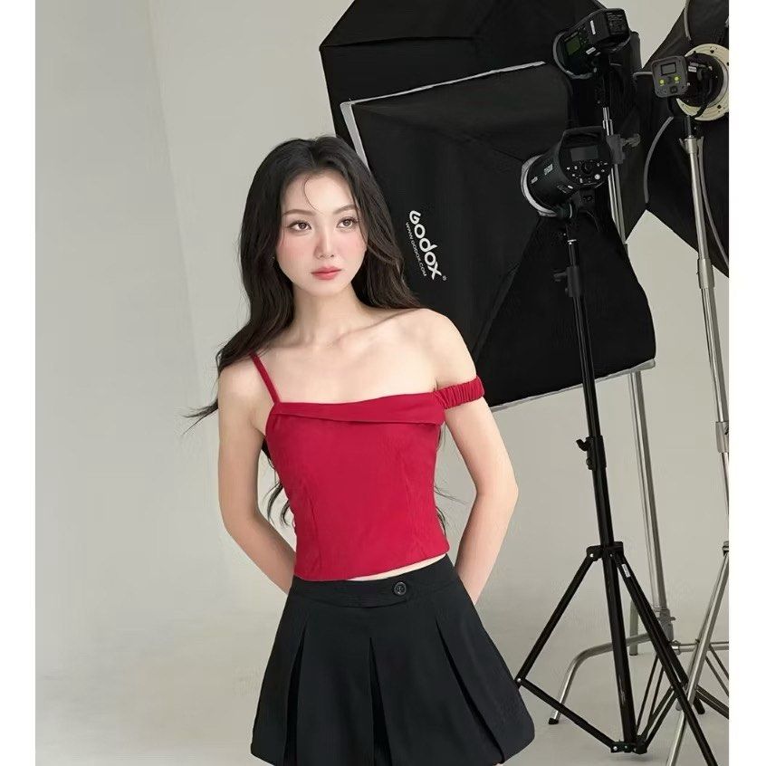 Red off-shoulder assymetrical top (Category: Sleeveless) located in Quezon City. Submitted by declutterwjjj (Listing ID 1367972147, Image 3). Description: Brand new with tag. From a Vietnamese brand called mifworkshop on ig! Looks really good and pretty in actual just big on me :( Size S, size chart posted. Retails 896 on 🍊app selling low. .