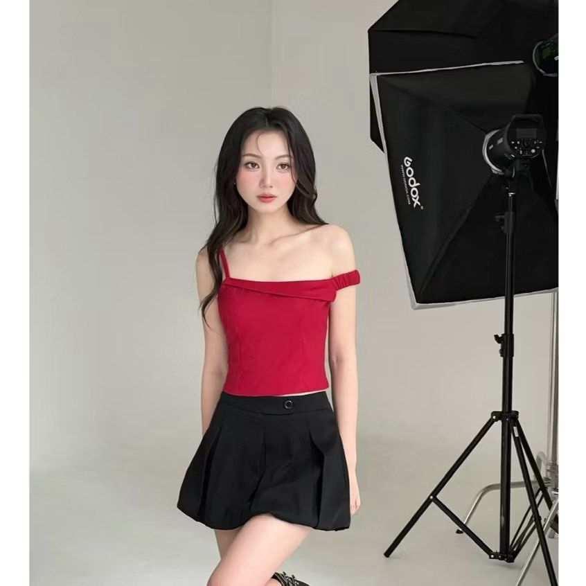 Red off-shoulder assymetrical top (Category: Sleeveless) located in Quezon City. Submitted by declutterwjjj (Listing ID 1367972147, Image 2). Description: Brand new with tag. From a Vietnamese brand called mifworkshop on ig! Looks really good and pretty in actual just big on me :( Size S, size chart posted. Retails 896 on 🍊app selling low. .