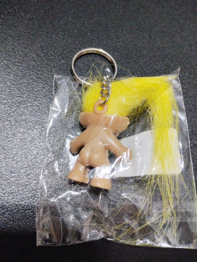 Trolls keychain (Category: Character Goods) located in Manila. Submitted by krystalchewey_ (Listing ID 1368000024, Image 2). Description: Actual Photo Posted bnew keychain 180php.