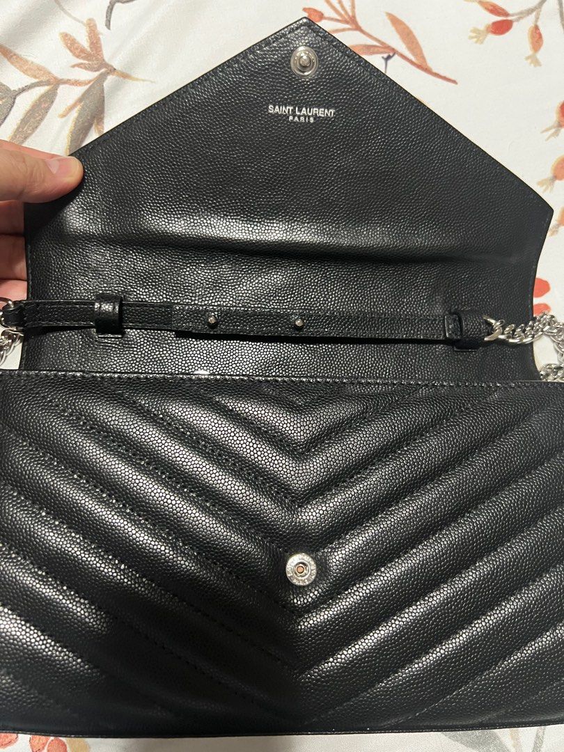 YSL (authentic WOC) (Category: Luxury Bags & Wallets) located in Mandaluyong City. Submitted by richelle_22 (Listing ID 1367952149, Image 2). Description: Authentic; with flaws inside (see pics); outside is in good condition; selling low.