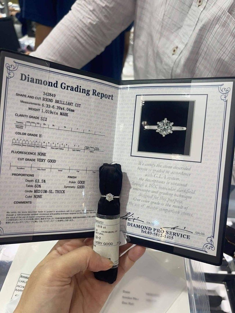 1 Carat Natural Round Cut Diamond Ring (Category: Rings) located in Makati City. Submitted by _aczhcny (Listing ID 1368085726, Image 2). Description: 1.019 CT Natural Round Brilliant Cut Diamond Complete set with Diamond Grading Report Card, papers, etc. • Clarity: S12 • Color: H Cut • Grade: Very Good • Fluorescence: None • Ring size : 6 Platinum band. .