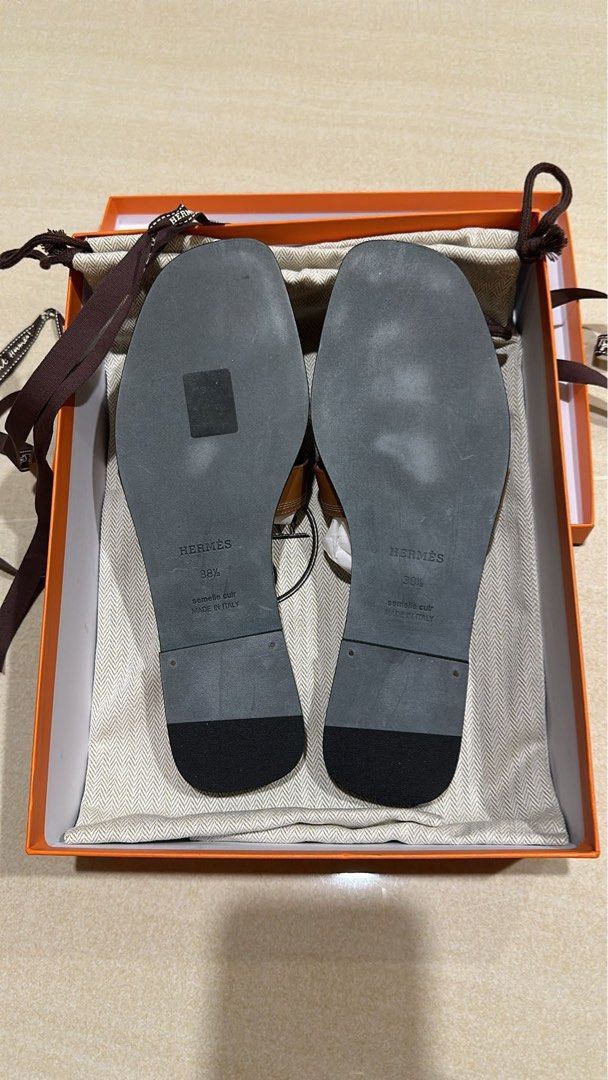 Authentic Hermes Oran Sandals Gold (Category: Sneakers & Footwear) located in Quezon City. Submitted by breakmyfashion (Listing ID 1368152526, Image 2). Description: Comes in full set with receipt, box, paperbag and dust bag. .