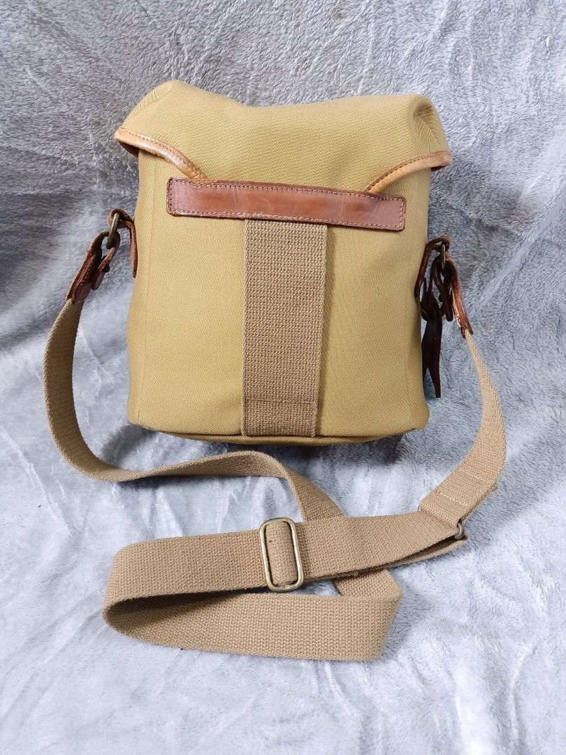 Billingham rucksack camera bag (Category: Camera Bags & Carriers) located in Asingan. Submitted by arnelpalaris8 (Listing ID 1368139533, Image 2). Description: Billingham Rucksack camera Bag Made in England Color Khaki 2 front pocket Verygood Condition Sign of used Missing inside accessories Pls check all Pics 1.5k FREESHIPPING PM ME.