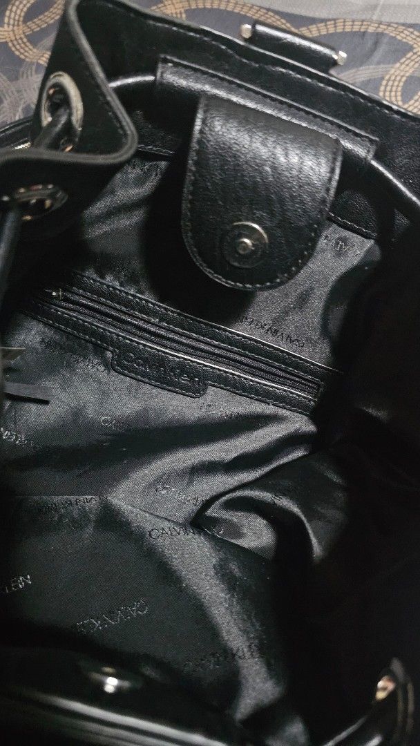 Calvin Klein 2-way bag (Category: Luxury Bags & Wallets) located in Quezon City. Submitted by keithchain (Listing ID 1368193846, Image 3). Description: Sack style backpack/ crossbody 2-way bag Send your best offer Flaws slight chopping. check last photos. 📍Acacia, Taguig.