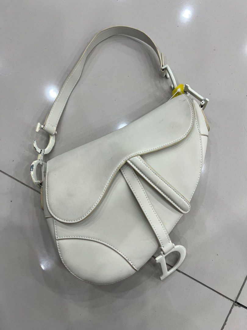 Christian Dior Saddle Bag (Category: Luxury Bags & Wallets) located in Bacolod City. Submitted by novymae23 (Listing ID 1368167204, Image 1). Description: Christian Dior Saddle Bag Size Small Minor Sign Of Usage .