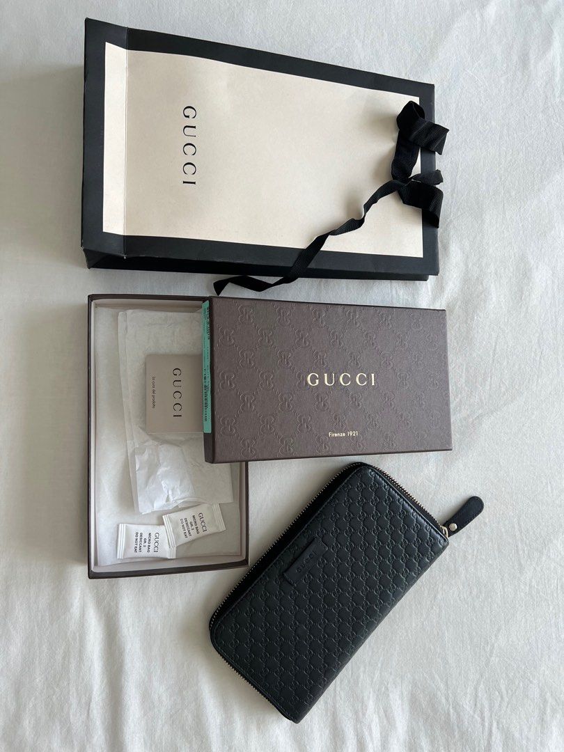 Gucci Wallet (Category: Luxury Bags & Wallets) located in Pasig City. Submitted by elaisl (Listing ID 1368063290, Image 2). Description: Negotiable Womens Leather Black Authentic.