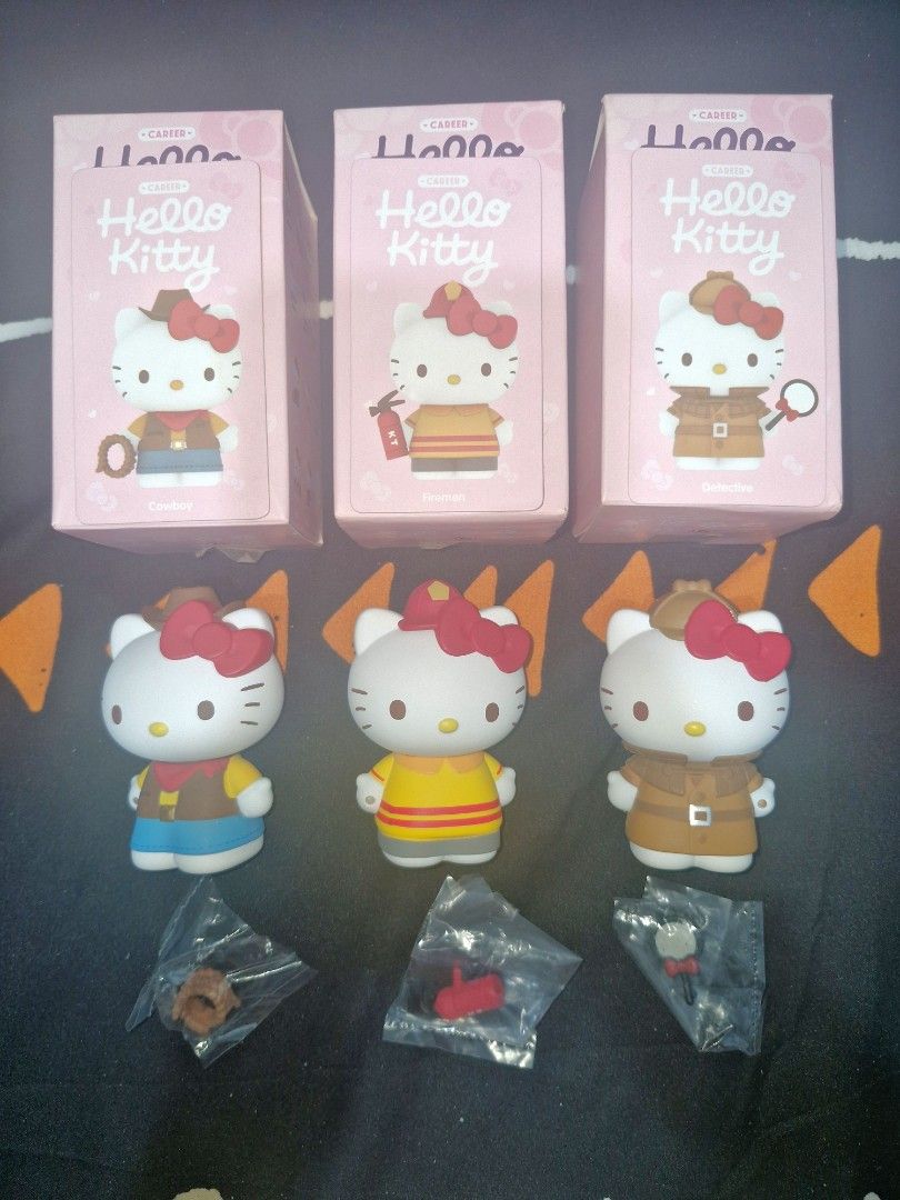 Hello Kitty Pop Mart (Career Series) (Category: Designer & Blind Box Toys) located in Imus. Submitted by julieeebels (Listing ID 1368180209, Image 1). Description: 600 each ‼️ Sanrio | Hello Kitty | Pop Mart | Career - Cowboy - Fireman - Detective Unsealed but never displayed. Bought these from resellers for 800 each. Complete inclusions (foil, card, box). RFS: Duplicates; bought entire set.