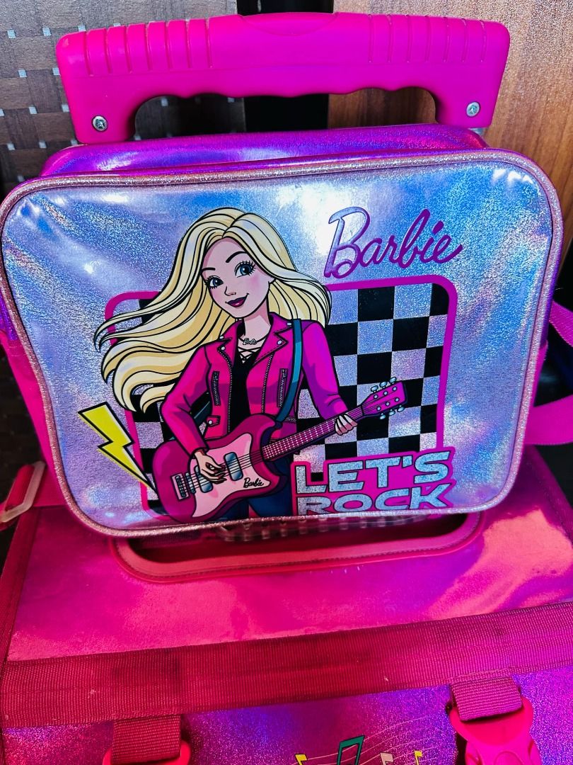 Original Barbie Stroller Bag (Category: Strollers) located in Taguig. Submitted by ian_76ers (Listing ID 1368169277, Image 2). Description: Original Barbie Stroller bag with Lunch box and cover. Used only in school year 2023-24 in her kindergarten days.