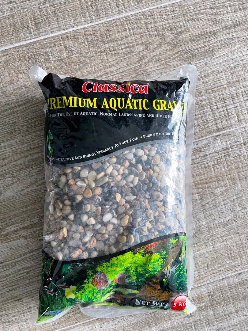 Aquarium gravel river pebbles stones premium 5kg (Category: Homes & Other Pet Accessories) located in Singapore. Submitted by azurecyanide (Listing ID 1372307461, Image 1). Description: 5kg River pebbles gravel for aquarium decoration, this is medium to small size, another listing for large size. Both have 1 each only bought new from nanyang trading but never open. Selling at loss you can see the price tag. If you need please message me.