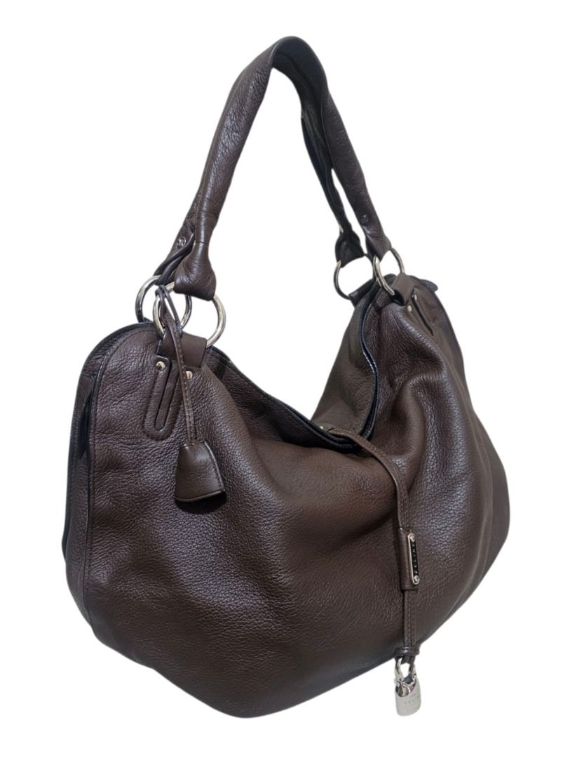 AUTHENTIC CELINE LARGE LEATHER BITTERSWEET PADLOCK TOTE / HOBO BAG (Category: Tote Bags) located in Makati City. Submitted by maximum_happiness (Listing ID 1372396442, Image 3). Description: READ, READ, READ, READ THE ITEM DESCRIPTION GUARANTEED AUTHENTIC OR FULL REFUND MORE DETAILED PICS HERE - https://jpegbay.com/gallery/009254265-.html#1 MID 2000’S PIECE SOFT AND SUPPLE GRAINED LEATHER EXTERIOR AND HANDLES – RUCHED DETAIL ON THE BASE - SILVER 