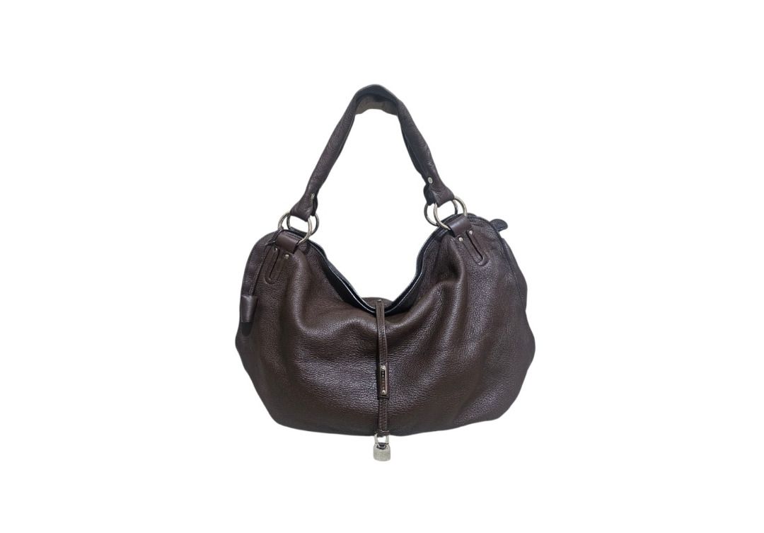 AUTHENTIC CELINE LARGE LEATHER BITTERSWEET PADLOCK TOTE / HOBO BAG (Category: Tote Bags) located in Makati City. Submitted by maximum_happiness (Listing ID 1372396442, Image 1). Description: READ, READ, READ, READ THE ITEM DESCRIPTION GUARANTEED AUTHENTIC OR FULL REFUND MORE DETAILED PICS HERE - https://jpegbay.com/gallery/009254265-.html#1 MID 2000’S PIECE SOFT AND SUPPLE GRAINED LEATHER EXTERIOR AND HANDLES – RUCHED DETAIL ON THE BASE - SILVER 