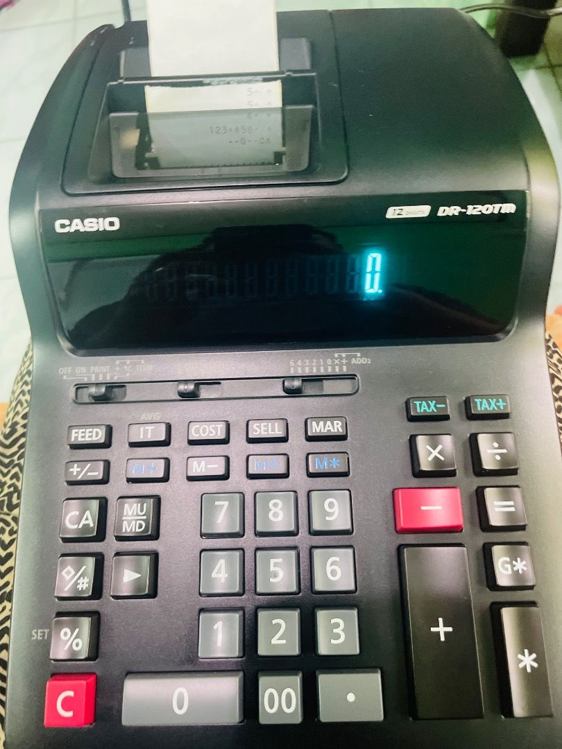 Casio Desk-Top Printer/Adding Machine (Category: Office & Business Technology) located in Manila. Submitted by jazhladjahali (Listing ID 1372310956, Image 2). Description: Original Casio Desk-Top Printer/Adding Machine 3.5 Line/Second High-Speed 2 Color Printer Large Display Tax Calculation Item Counter 12 Digits PM me for inquires 09656421059 Location - Bacoor and Manila.