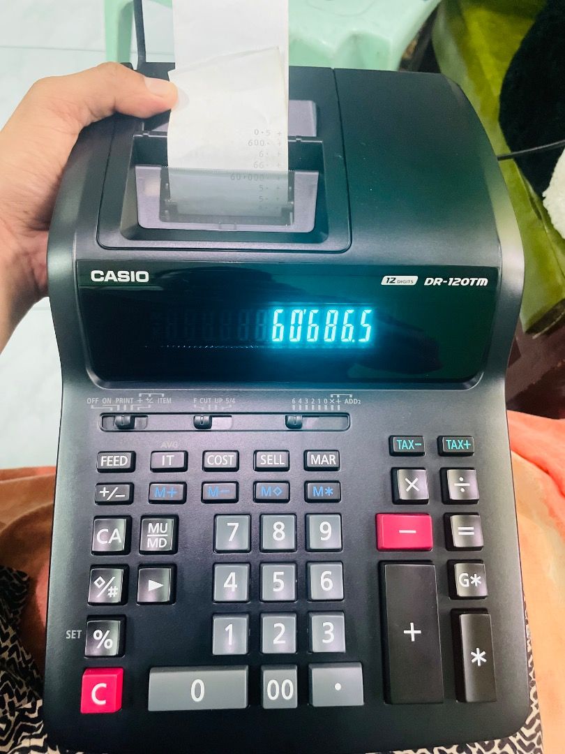 Casio Desk-Top Printer/Adding Machine (Category: Office & Business Technology) located in Manila. Submitted by jazhladjahali (Listing ID 1372310956, Image 1). Description: Original Casio Desk-Top Printer/Adding Machine 3.5 Line/Second High-Speed 2 Color Printer Large Display Tax Calculation Item Counter 12 Digits PM me for inquires 09656421059 Location - Bacoor and Manila.