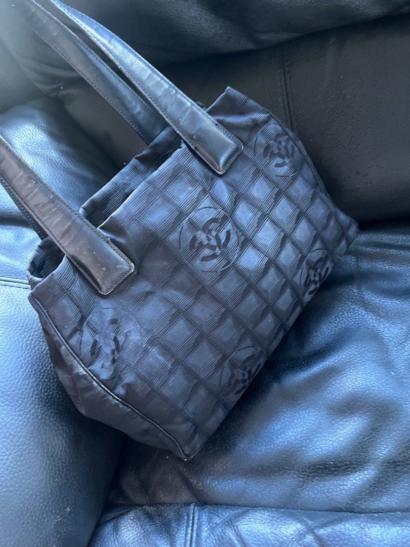 Chanel Nylon Tote Bag (Category: Luxury Bags & Wallets) located in Quezon City. Submitted by vianca13 (Listing ID 1372373246, Image 3). Description: Chanel medium tote from Japan * can fit 13 inch macbook W hologram tag Kindly zoom for sign of use - handling rubber lining *last pic for reference #chanel #japansourced #chanel tote.