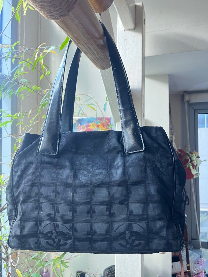 Chanel Nylon Tote Bag (Category: Luxury Bags & Wallets) located in Quezon City. Submitted by vianca13 (Listing ID 1372373246, Image 2). Description: Chanel medium tote from Japan * can fit 13 inch macbook W hologram tag Kindly zoom for sign of use - handling rubber lining *last pic for reference #chanel #japansourced #chanel tote.