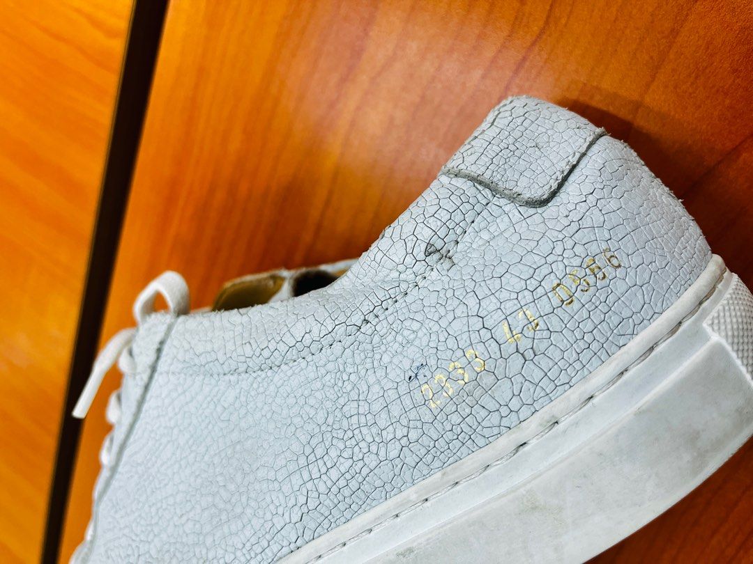 Common Projects (Category: Sneakers) located in Manila. Submitted by soyfresh (Listing ID 1372425401, Image 3). Description: Cracked White Leather Achilles 2333 0566 EU 43 No inclusions .