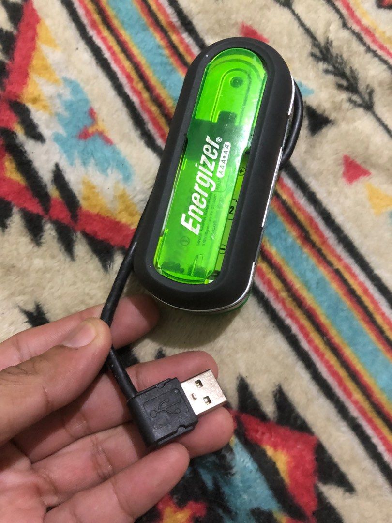 Energizer portable AA battery usb charger (Category: Batteries & Chargers) located in Quezon City. Submitted by markgolveo (Listing ID 1372447731, Image 1). Description: Energizer portable AA battery usb charger.
